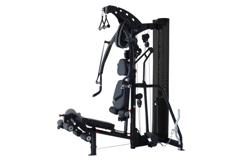 Black multi-gym system with cable machines, padded seat, and overhead pulley attachment on white background