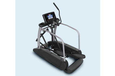Commercial elliptical machine with black pedals, silver frame, and digital console displaying blue screen on light blue backg