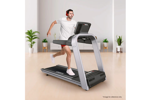 Landice L7 treadmill with black running deck, silver frame, and digital display console on white background