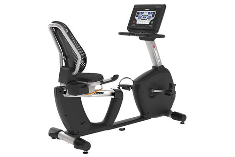Landice R7 black recumbent exercise bike with digital console display and mesh seat back, on light blue background