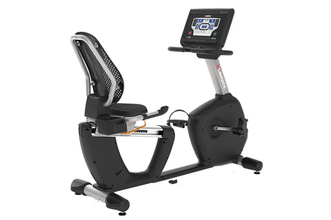 Black and silver recumbent exercise bike with digital display console and padded seat, on light blue background