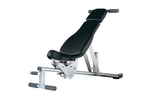 Weight bench with black padded seat and backrest, silver metal frame, leg extension attachment, and adjustable foot rest on w