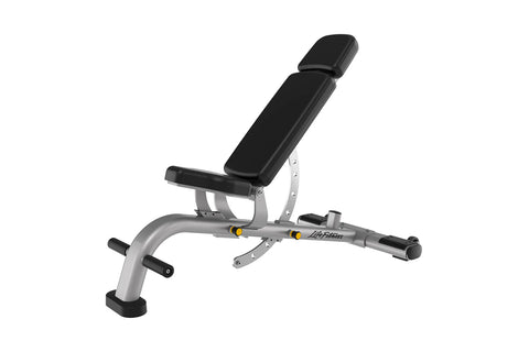 Life Fitness multi-adjustable weight bench with silver metal frame, black padded seat and backrest, and leg extension attachm