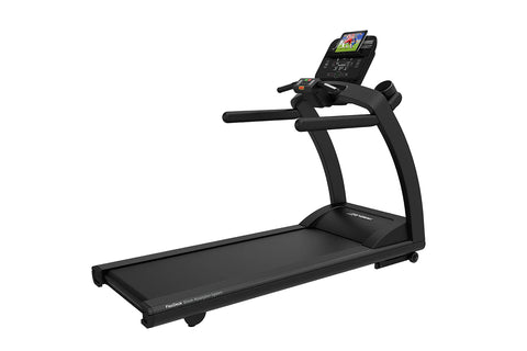 Black Life Fitness treadmill with curved frame, padded running deck, and digital display console mounted on handles showing f
