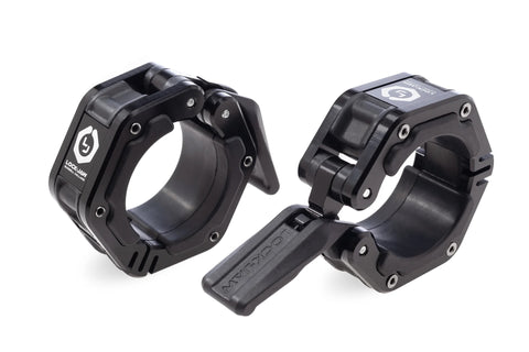 Black metal barbell collars with locking jaw mechanism and magnetic fasteners, displayed on white background