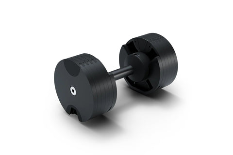 Pair of black Matrix adjustable dumbbells with yellow accents and textured grip handles, displayed on white background