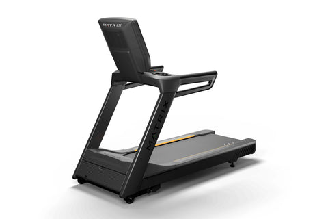 Black Matrix commercial treadmill with digital touchscreen display showing workout interface, wide running deck, and orange a