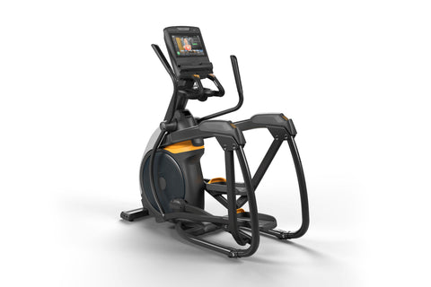 Black and orange elliptical machine with digital display console, dual handles, and foot pedals on white background