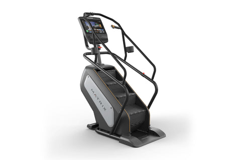 Matrix Performance ClimbMill with black frame, white side panel, digital touchscreen display, and dual handrails on white bac