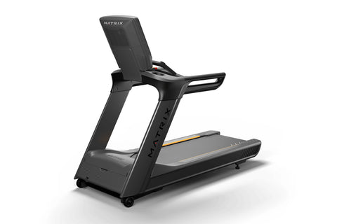 Black and gray commercial treadmill with integrated touchscreen display, gold accents, and cushioned running deck on white ba