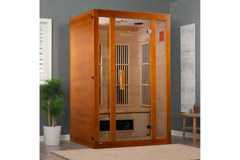 Two-person infrared sauna with orange cedar wood frame, glass front door, and interior heaters visible on white background