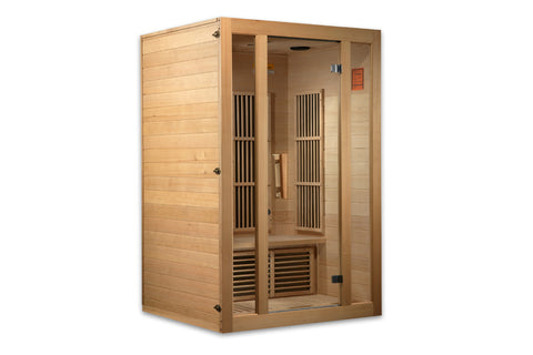 Natural wood far-infrared sauna cabin with glass front door, wooden benches, and vertical heater panels inside on white backg