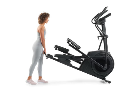 Black elliptical machine with digital display screen and curved handlebar arms, on white background