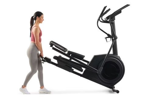 Black NordicTrack AirGlide 7i elliptical machine with digital display console, dual handles, and pedals on white background