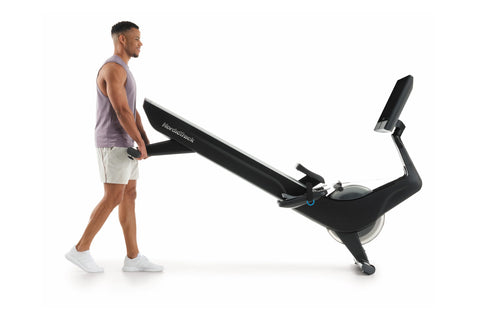 NordicTrack RW900 black rowing machine with gray accents and tablet holder displaying fitness class on white background