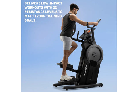 Black NordicTrack Step Climber XL with dual handlebars and large foot pedals on white background