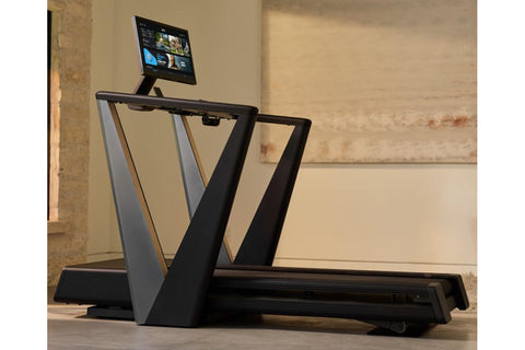 NordicTrack Ultra 3 treadmill with black and gray frame, touchscreen display mounted on stand, and running belt on white back