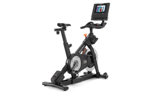 Black and gray NordicTrack S10i stationary exercise bike with adjustable seat, handlebars, and digital display console on whi