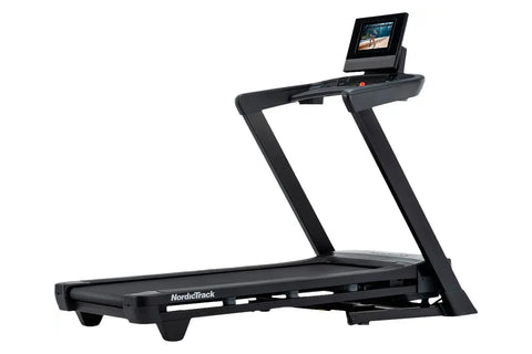 Black NordicTrack T-Series 10 treadmill with digital touchscreen console displaying workout content on white background