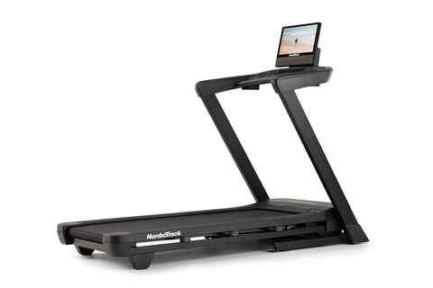 NordicTrack T-Series 16 treadmill with black frame, running deck, and attached digital display console showing beach scene on