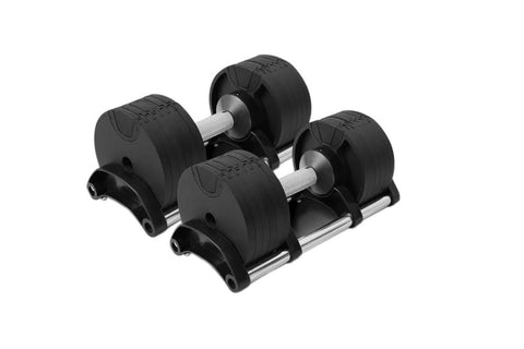 Pair of black adjustable dumbbells with ribbed rubber weight plates and silver metal handles, shown on white background