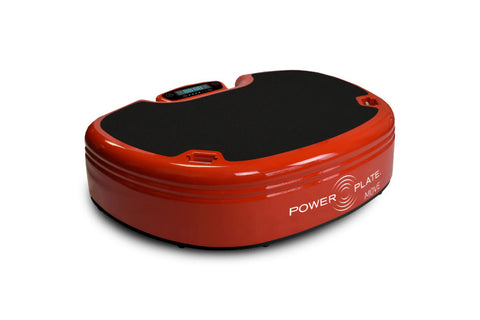 Red and black Power Plate MOVE vibration platform with digital display on white background