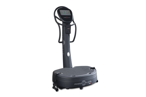 Black Power Plate My8 vibration plate fitness machine with digital display console and handle bars, on white background