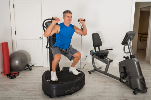 Power Plate Pro8 vibration plate trainer with black base platform, upright column, and digital display monitor on white backg