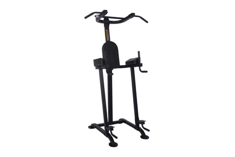 Black vertical power tower with dual handles, padded seat, leg extension platform, and stabilizing feet on white background