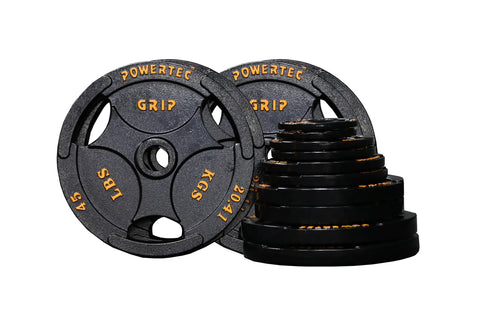 Powertec Grip black cast iron Olympic weight plates with gold text, displayed with two plates and stacked plates showing vari