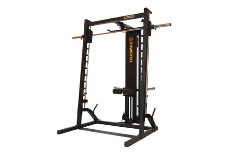 Powertec black steel roller Smith machine with multiple barbell plate pegs, chrome barbell, and adjustable safety arms on whi