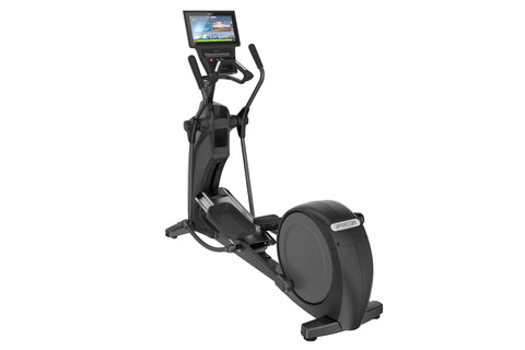 Black elliptical machine with large oval footplate, dual handlebar grips, and integrated tablet display console on white back