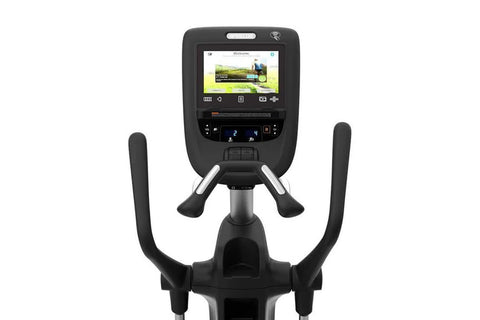 Black Precor EFX 865 elliptical machine with digital console display and moving handlebars, viewed from the side on white bac