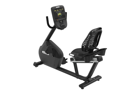 Black recumbent exercise bike with digital console displaying workout metrics, ventilated backrest, and foot pedals on white 