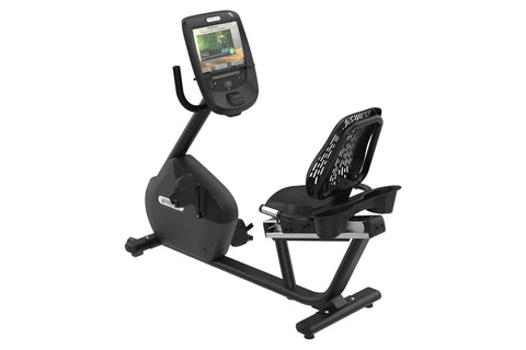 Black recumbent exercise bike with digital console display showing workout metrics, adjustable backrest and seat, on white ba