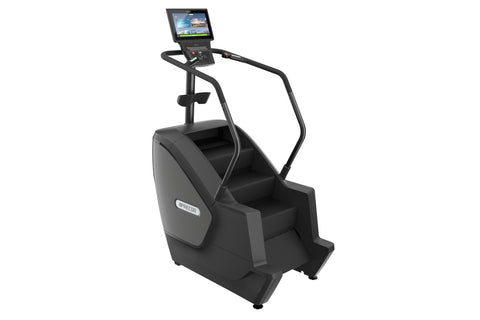 Black Precor stair climber with dual handrails, wide footplate, and integrated display console showing workout metrics on whi