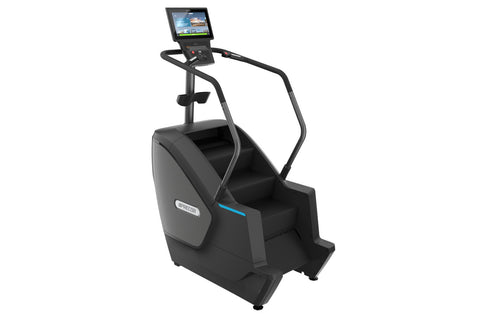 Black Precor stair climber with dual handrails, wide footplate, and integrated display console showing workout metrics on whi