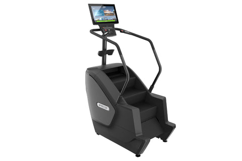 Black Precor stair climber with integrated handrails, digital console display, and control panel on white background