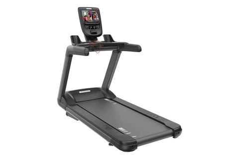 Black commercial treadmill with digital console, handrails, and running deck on white background