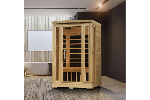 Two-person infrared sauna with natural wood construction, glass front doors, wooden benches, and black heating panels visible
