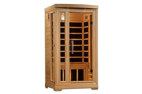 Natural wood infrared sauna cabin with glass front door, wooden bench seating, and metal handle on white background