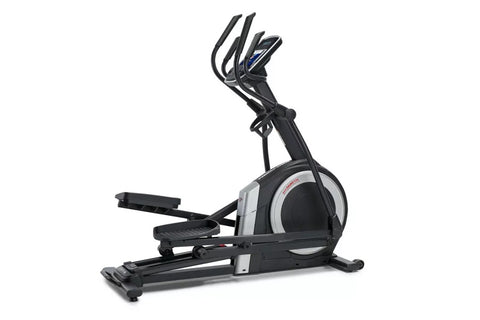 Black and white ProForm Carbon EL elliptical machine with digital display console, dual handles, and foot pedals on white bac