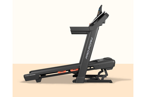 ProForm Carbon Pro 2000 black treadmill with touchscreen display and orange accent accents on white background