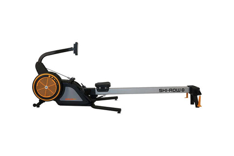SKI-ROW AIR rowing machine with black frame, white vertical rail, orange and black flywheel, and extended footrest on white b