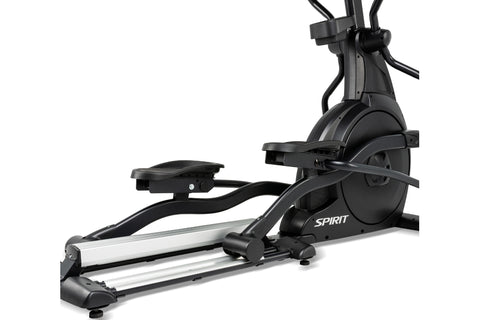 Black elliptical machine with digital console, dual handles, and silver foot pedals on white background