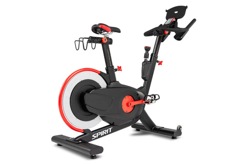Spirit CIC850 indoor cycle with black frame, red and white flywheel, adjustable seat and handlebars, digital display, and tab
