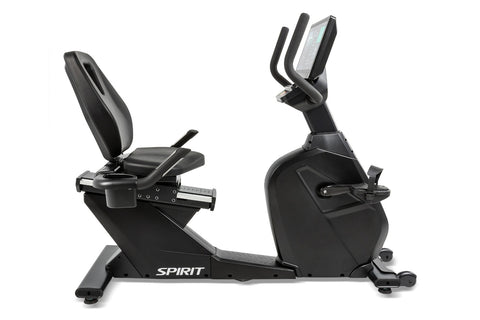Spirit CR1000ENT black recumbent exercise bike with digital display console, padded seat, and foot pedals on white background