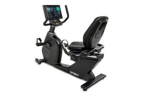 Spirit CR1000ENT black recumbent exercise bike with digital display console, padded seat, and foot pedals on white background