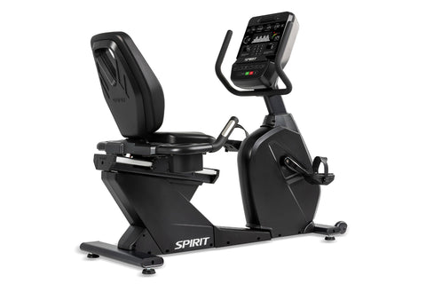 Spirit CR900 black recumbent exercise bike with digital console, padded seat, and foot pedals on white background