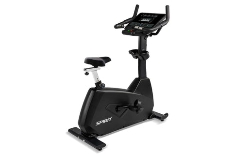 Spirit CU800 black upright stationary exercise bike with digital console, padded seat, and handlebars on white background